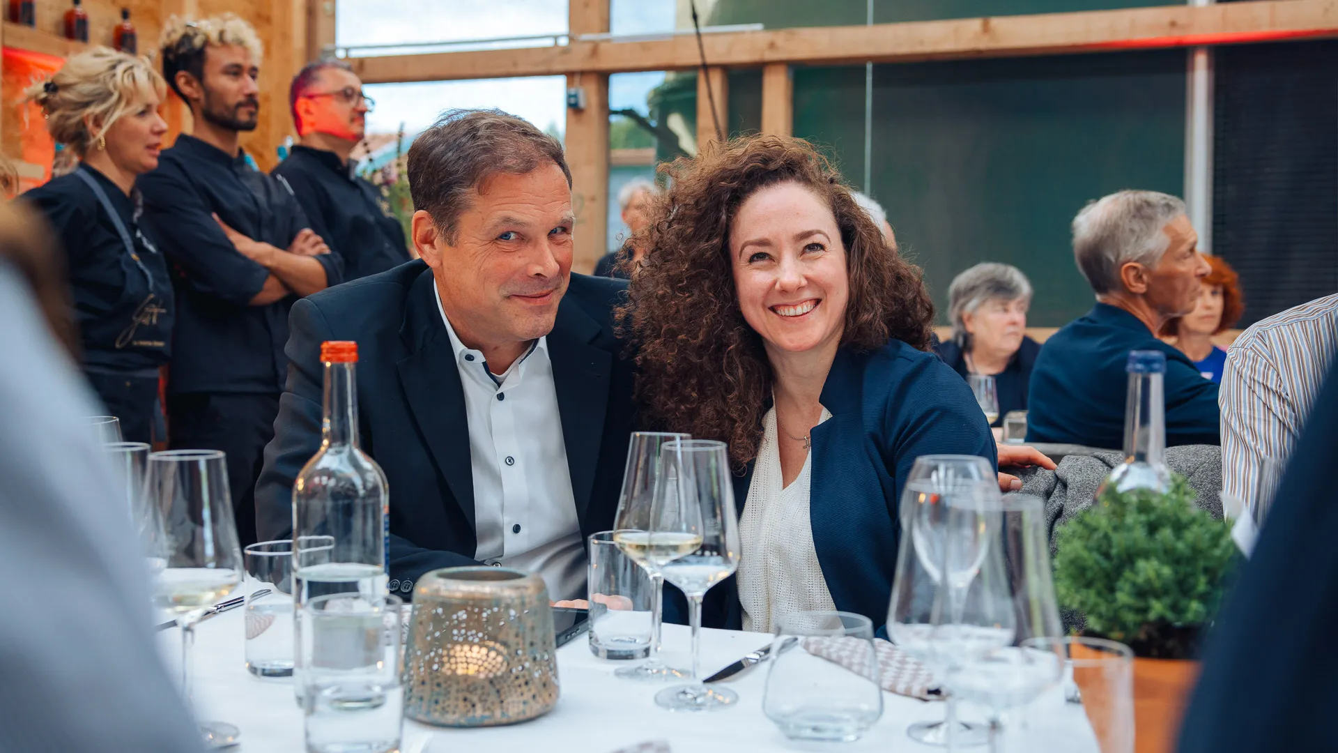 Corporate event photography Hamburg — guests at an evening corporate dinner